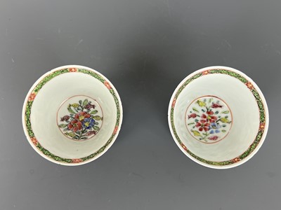 Lot 93 - A pair of Chinese famille rose “flowers” cups,...