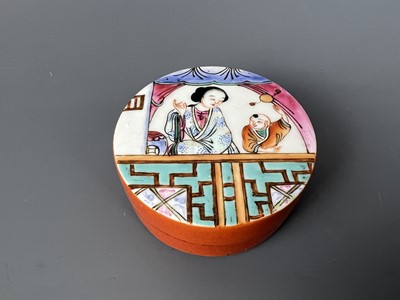 Lot 95 - A Chinese famille rose “figures” box with...