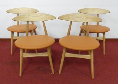 Lot 488 - In the style of Hans Wegner - a set of four...
