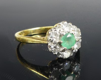 Lot 2877 - An 18ct gold and platinum, emerald and diamond...