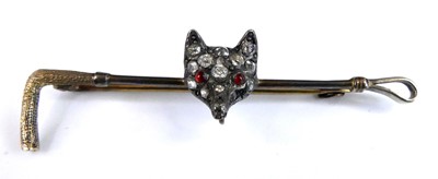 Lot 2896 - A yellow and white metal diamond bar brooch in...
