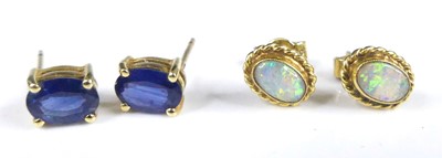 Lot 2911 - A pair of modern 18ct gold and cabochon opal...