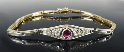 Lot 2916 - A yellow and white metal, ruby and diamond set...