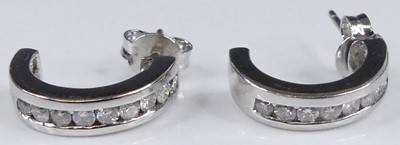 Lot 2917 - A pair of modern 9ct white gold and diamond...