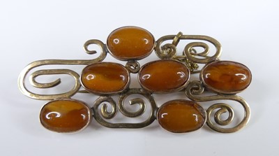 Lot 2945 - A 9ct gold butterscotch amber set abstract...