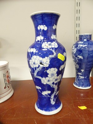 Lot 69 - A Chinese blue and white porcelain prunus vase,...