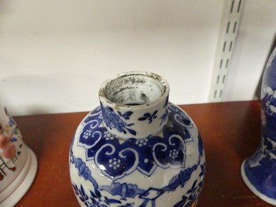 Lot 69 - A Chinese blue and white porcelain prunus vase,...