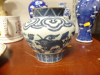 Lot 69 - A Chinese blue and white porcelain prunus vase,...