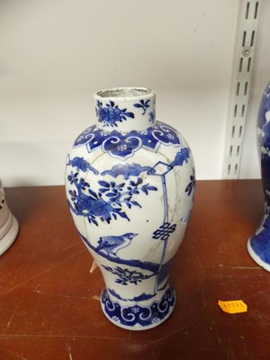 Lot 69 - A Chinese blue and white porcelain prunus vase,...