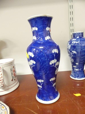 Lot 69 - A Chinese blue and white porcelain prunus vase,...