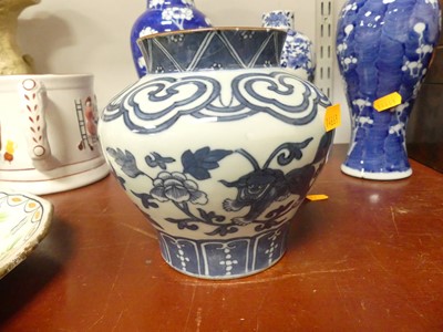 Lot 69 - A Chinese blue and white porcelain prunus vase,...