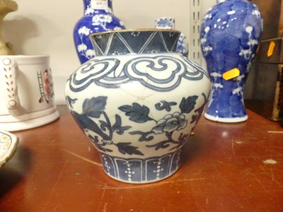 Lot 69 - A Chinese blue and white porcelain prunus vase,...