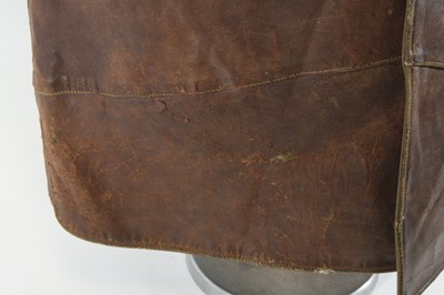 Lot 620 - A WW II British leather jerkin, in brown...