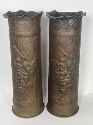 Lot 654 - A pair of WWI trench art shell cases with...