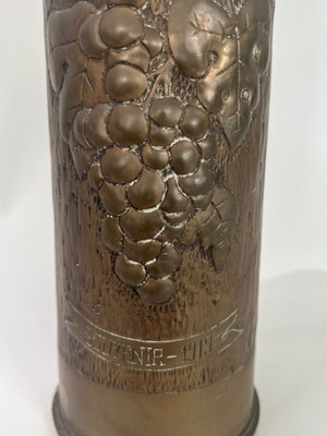 Lot 654 - A pair of WWI trench art shell cases with...