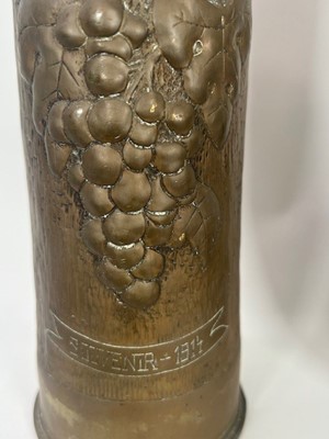 Lot 654 - A pair of WWI trench art shell cases with...