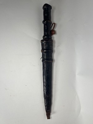 Lot 659 - A 19th Century African short sword / hunting...
