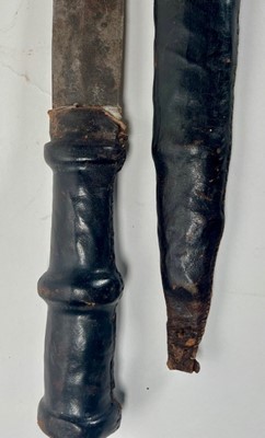 Lot 659 - A 19th Century African short sword / hunting...