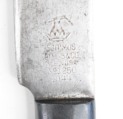 Lot 691 - A WW II U.S. Army issue machete, having a 37cm...