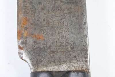 Lot 606 - A WW II U.S. Army issue machete, having a 37cm...