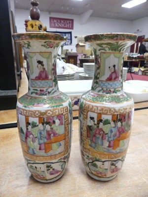 Lot 59 - A pair of Chinese Canton vases depicting...