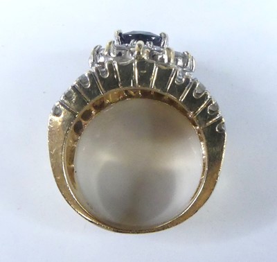 Lot 2621 - A yellow and white metal, sapphire and diamond...