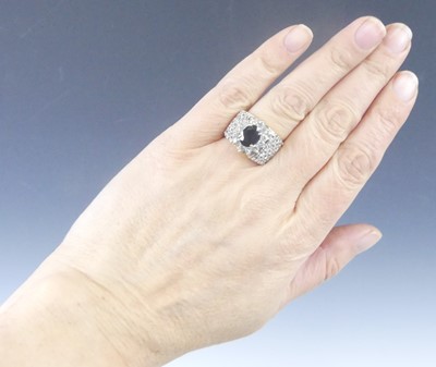 Lot 2621 - A yellow and white metal, sapphire and diamond...