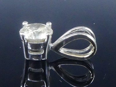 Lot 2622 - An 18ct white gold single stone pendant,...