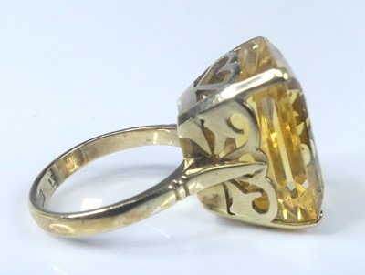 Lot 2623 - A yellow metal citrine set dress ring,...
