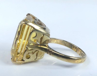 Lot 2623 - A yellow metal citrine set dress ring,...