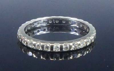 Lot 2625 - A white metal diamond eternity ring,...