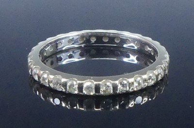 Lot 2625 - A white metal diamond eternity ring,...
