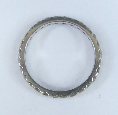 Lot 2625 - A white metal diamond eternity ring,...