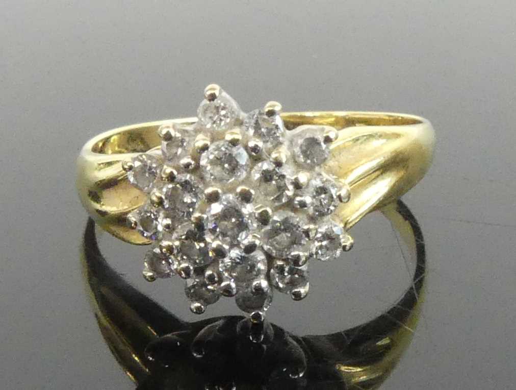 Lot 2631 - A yellow and white metal diamond circular...