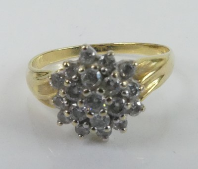 Lot 2631 - A yellow and white metal diamond circular...