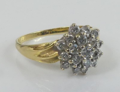 Lot 2631 - A yellow and white metal diamond circular...