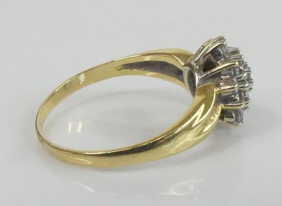 Lot 2631 - A yellow and white metal diamond circular...