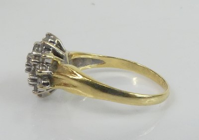 Lot 2631 - A yellow and white metal diamond circular...