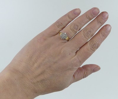 Lot 2631 - A yellow and white metal diamond circular...
