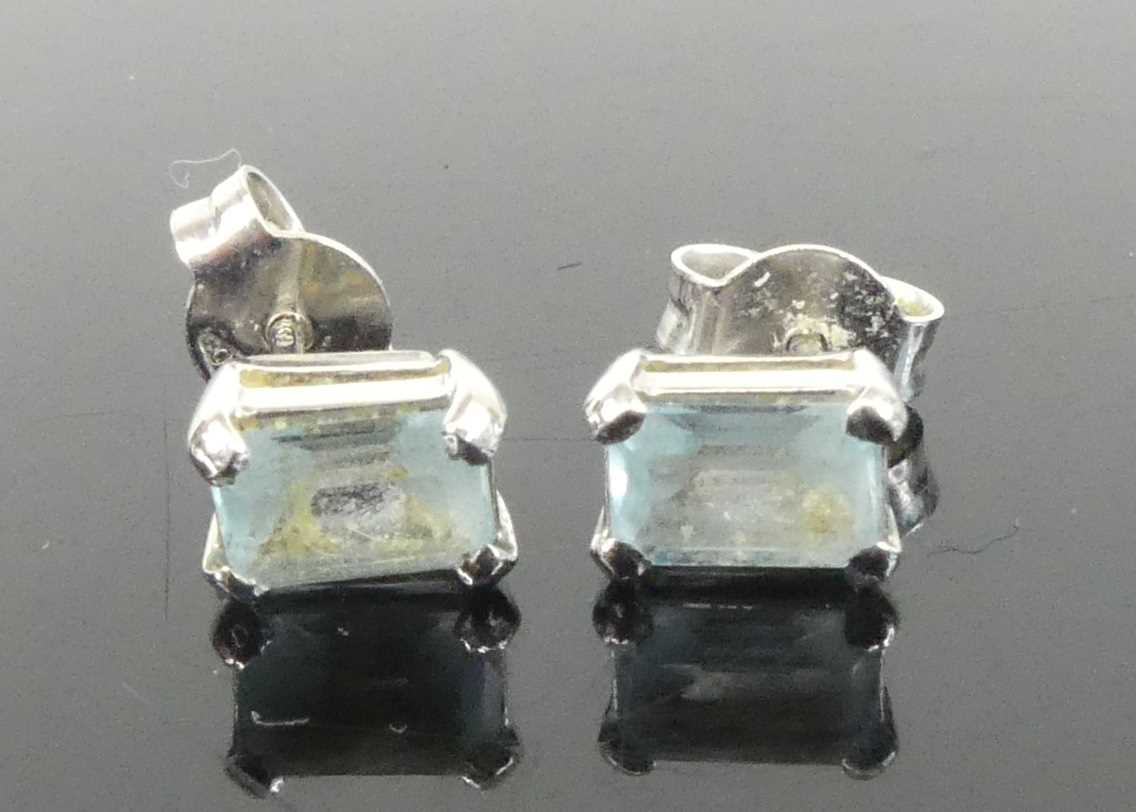 Lot 2647 - A pair of 18ct white gold aquamarine single...