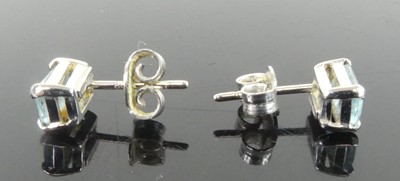 Lot 2647 - A pair of 18ct white gold aquamarine single...