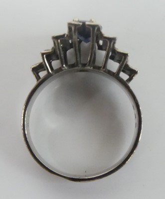 Lot 2648 - A white metal, sapphire and diamond lozenge...
