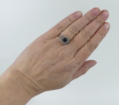 Lot 2648 - A white metal, sapphire and diamond lozenge...