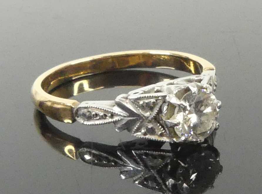 Lot 2605 - A yellow and white gold metal diamond...