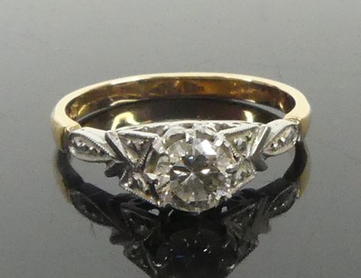 Lot 2605 - A yellow and white gold metal diamond...