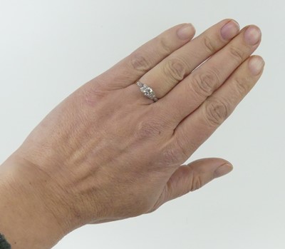 Lot 2605 - A yellow and white gold metal diamond...
