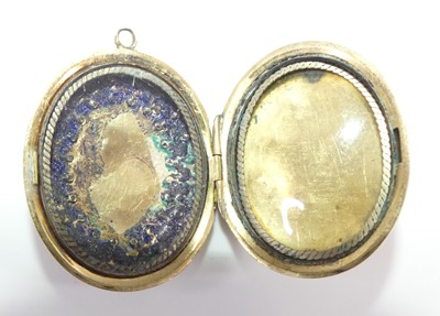 Lot 2533 - An Edwardian 9ct gold ruby and diamond set bar...