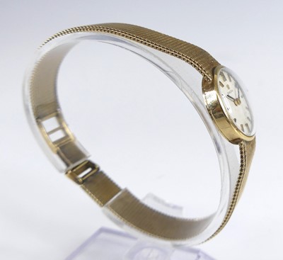 Lot 2639 - An Omega lady's 9ct gold cased bracelet watch,...