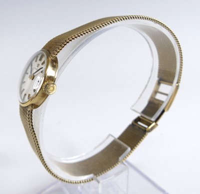 Lot 2639 - An Omega lady's 9ct gold cased bracelet watch,...