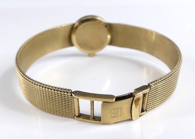 Lot 2639 - An Omega lady's 9ct gold cased bracelet watch,...